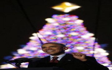 اوباما يضيء شجرة عيد الميلاد الوطنية في واشنطن الممطرة